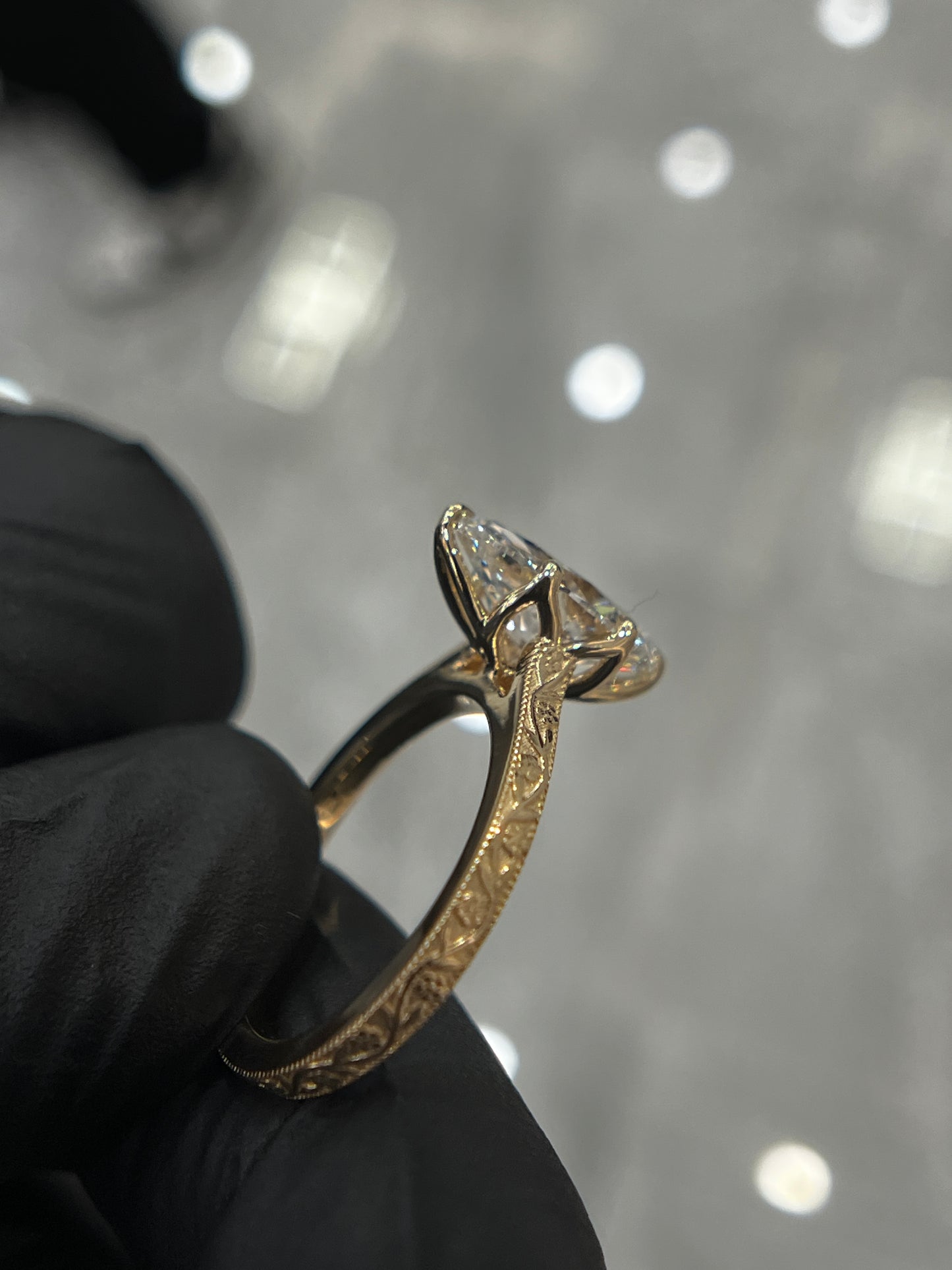 Floral engraved marquise ring