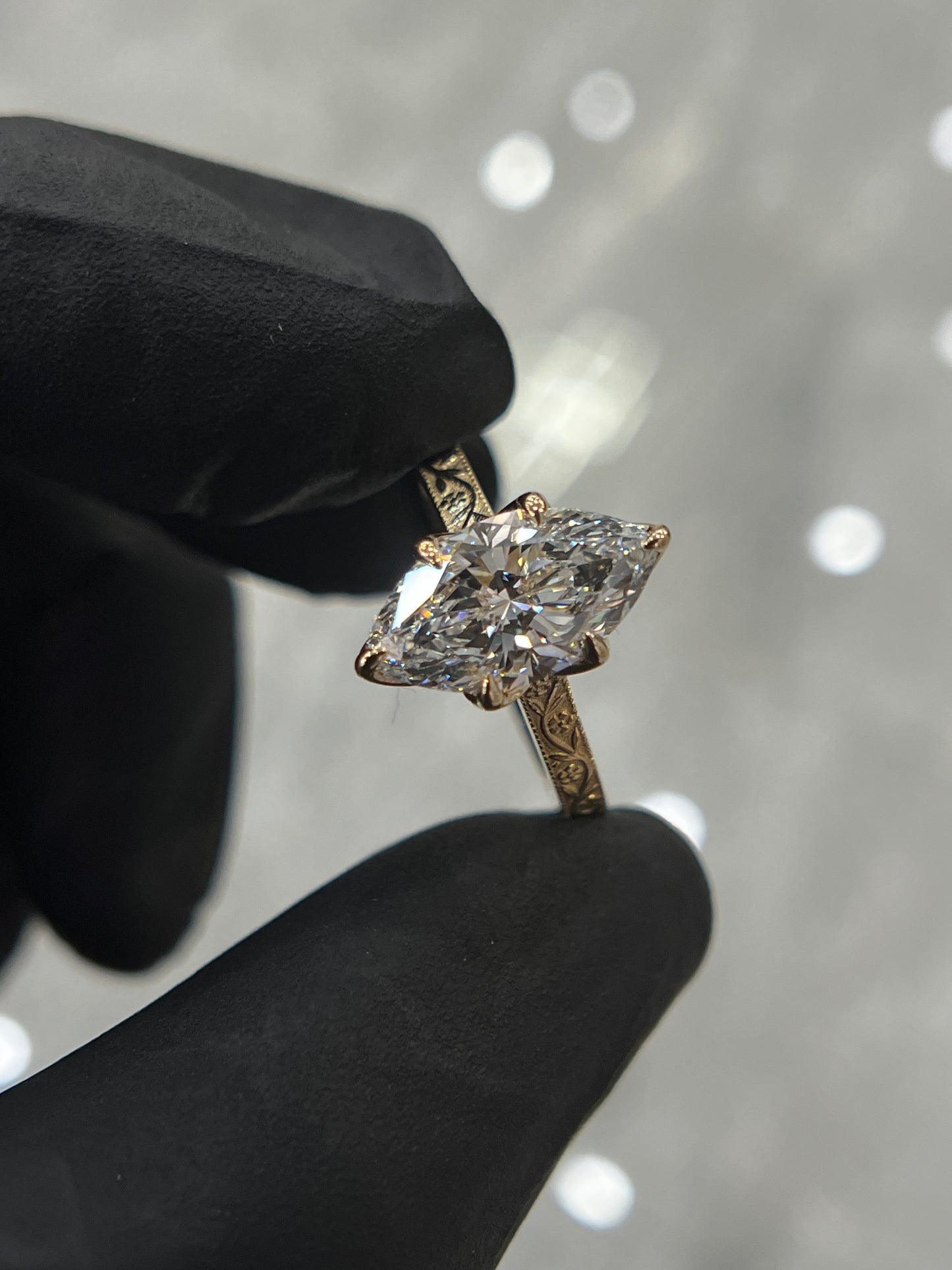 Floral engraved marquise ring