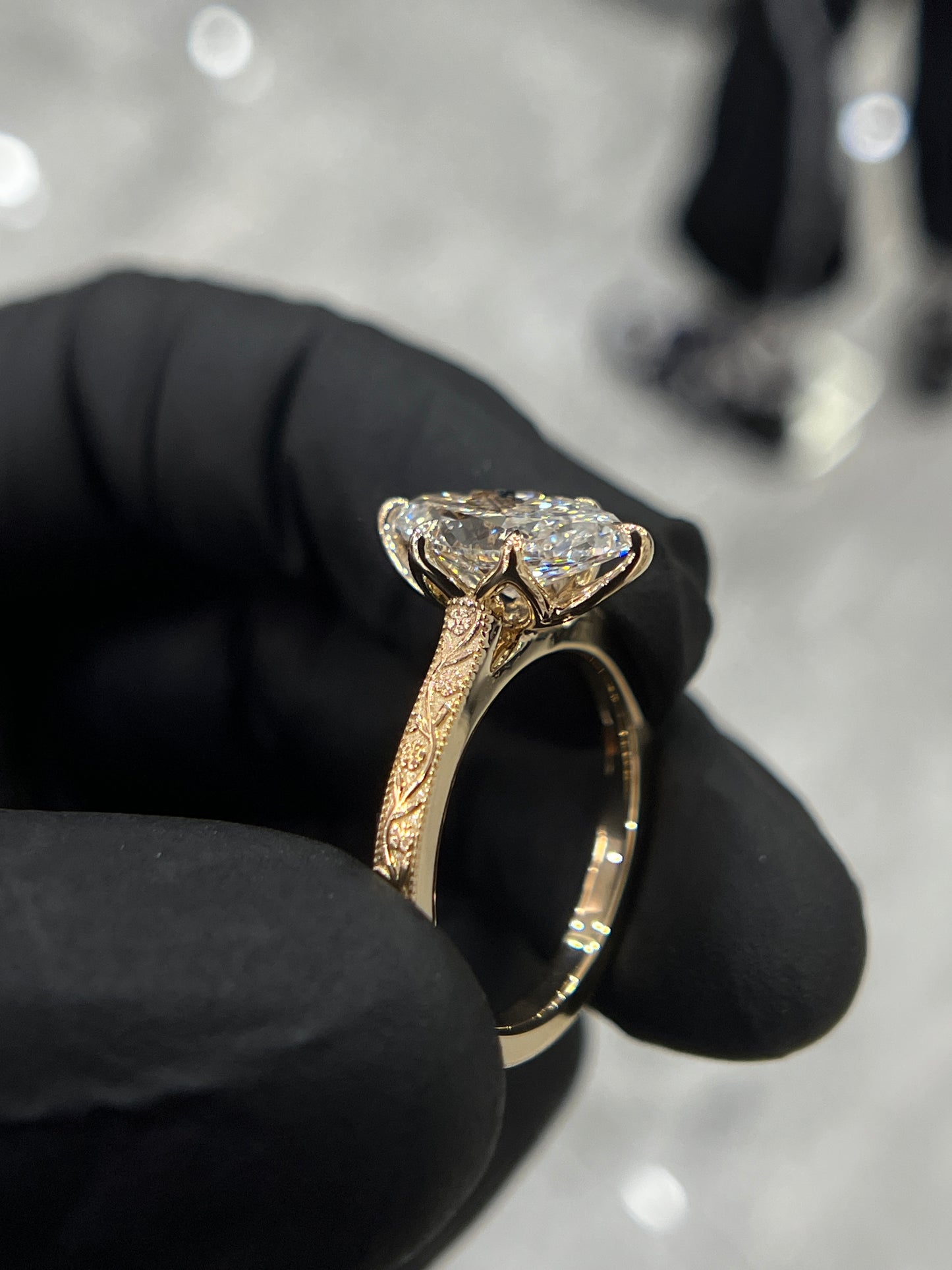 Floral engraved marquise ring